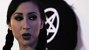 Er… Busty goth chick in high heel shoes makes her hour-glass like figure come to life