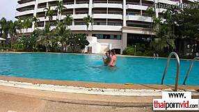 Young asian girl wearing black bra and panty has great huge natural tits gets fucked doggystyle by european man