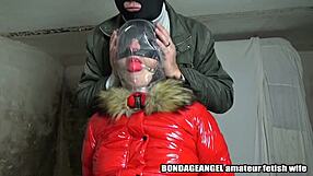 Adult play with PVC leggings and a wife wearing a blindfold