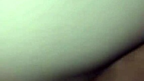 Wife lowering her head in front of her husband
