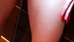 Full-frontal nude of a lustful young Russian woman making herself come in the shower