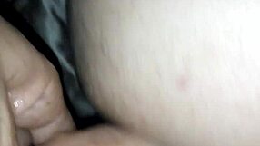 Two people who are not professionals try out the use of a strap-on during oral sex
