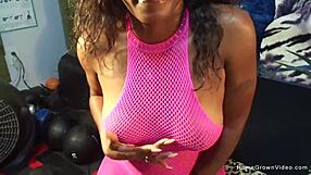 A buxom black lady performs blowjob and fuck a white man on a cam Recording