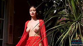 Megan Blake, the pretty face of this model of the moment, slips into a garden for some solo softcore