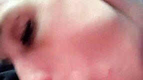 A white woman performs oral sex on a big black man’s penis in a car
