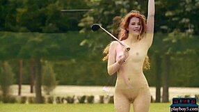 Heidi Romanova a sizzling redheaded beauty, starts the game in the buff in the nude golf course