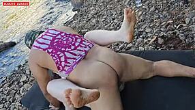 My wife gives her chubby friend a handsjob while taking a solo walk