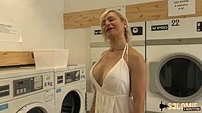 Kim, the busty MILF enjoying double penetration from two young men.