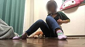 Young Japanese girl has sex with a sex doll and thinks it is a man giving her oral sex