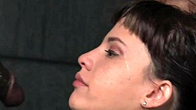 BDSM sub gets face fucked by two dominant men in a three woman and one man scene