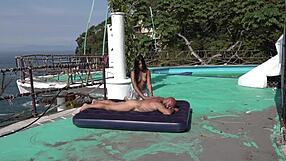 Two women enjoy a day at the beach and engage in sexual activities