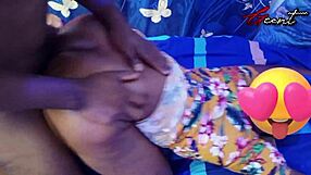 A steamy scene of a Nigerian beauty getting some pleasure from a Ghanaian hunk with a big black cock