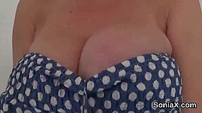 British wife Gill Ellis' large breasts and fetish wear