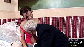 Close up of a young European man getting a rough ride from an older man