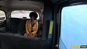An African beauty gets a rough ride in a fake taxi and enjoys a big cock