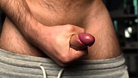 Young bodybuilder shows off his big cock in solo video