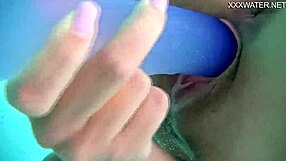 Nora Shmandora's underwater solo with purple dildo