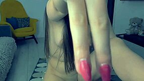 Beautiful young woman achieves great orgasm while masturbating on webcam