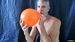 Richard Lennox, a hot gay DILF, in 1080p balloon fetish video