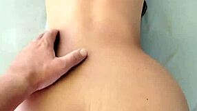 A sensual morning scene with a voluptuous woman and an ass worshiping lover